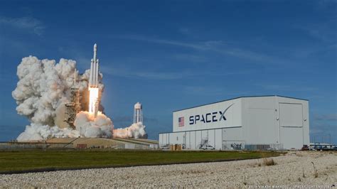 Spacexs Falcon Heavy Rocket Takes To The Skies For The First Time The