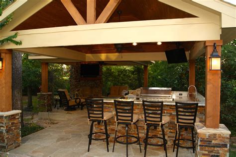 freestanding patio cover  kitchen fireplace   woodlands