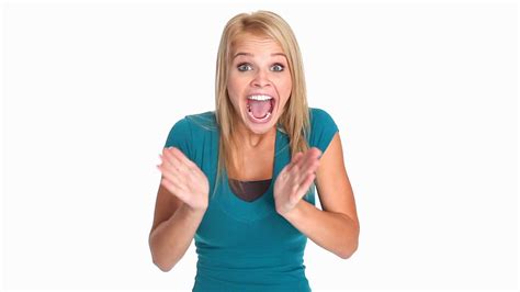 excited young woman waving  hands  laughing enthusiastically