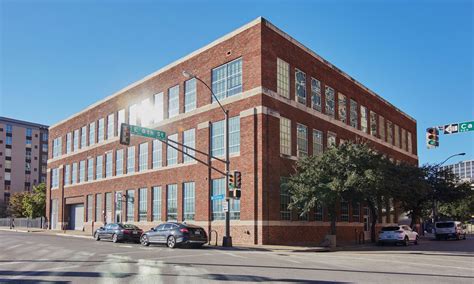 renovated historic fort worth office building—with moving glass