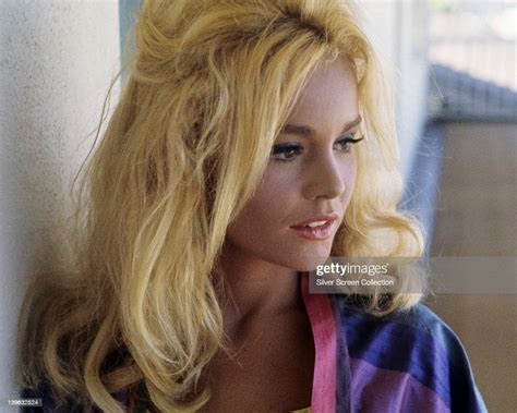 Tuesday Weld Us Actress With Long Blonde Hair Wearing A Pink Blue