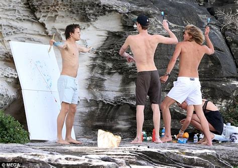 Shirtless Jordan Barrett Is Pelted With Paint By Friends