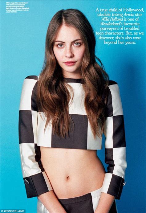 willa holland shows off her superhero figure as she bares her toned midriff in chic monochrome