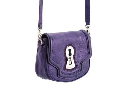 washington designer rocce  purses  carried   amand salon
