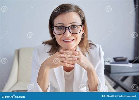 Female Mentor Tutor Teacher Looking At Webcam Closeup Face Stock