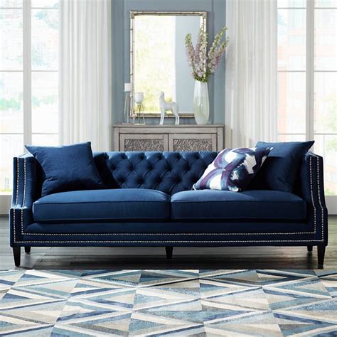 marilyn  wide blue velvet tufted upholstered sofa  lamps