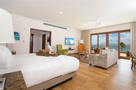 beachfront family suite master bedroom   reef  cuisinart anguilla luxury boutique hotel