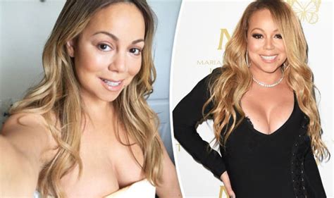 mariah carey oozes sex appeal as she shows off extreme cleavage in eye popping selfie