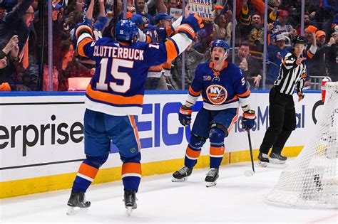 islanders claw   series  game  win  hurricanes