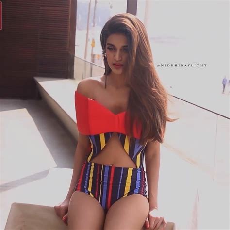 actress nidhhi agerwal instagram pictures in red dress