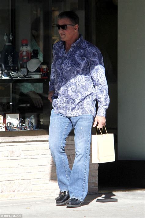 sylvester stallone picks up christmas t from jewelry store in