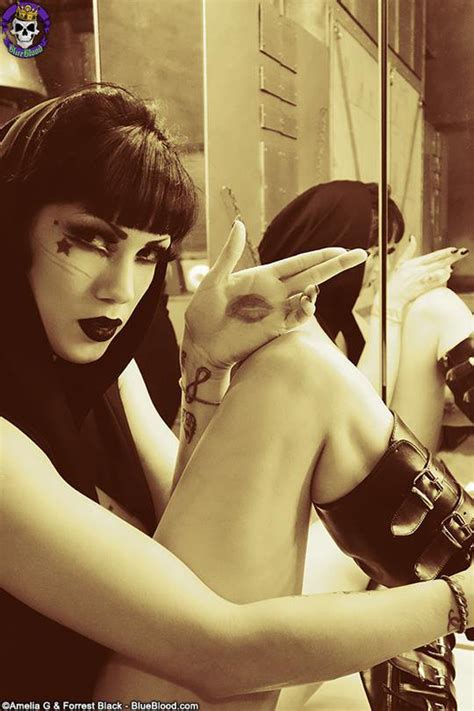 Goth Girl Asphyxia Posing And Stripping At Shoot Photos