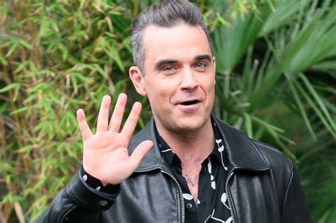 robbie williams wishes he was gay so he could have sex on tap as he admits he does have