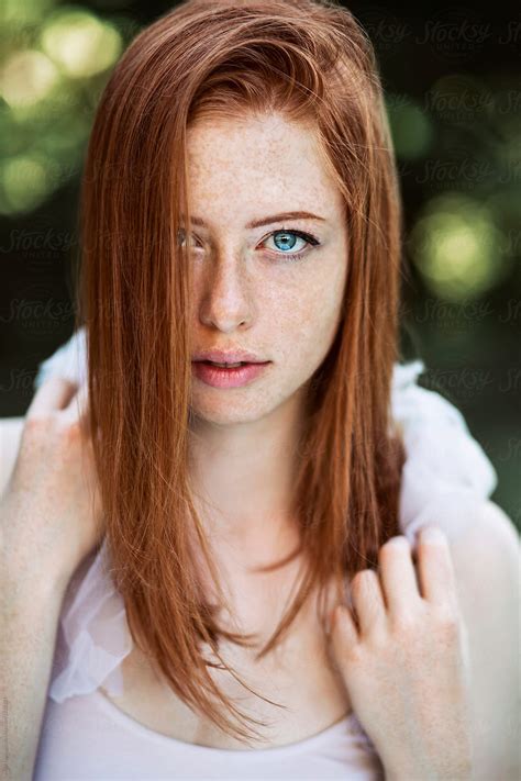 beautiful redhead with freckles stocksy united