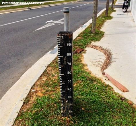 searching   remaining  flood gauges  singapore remember singapore