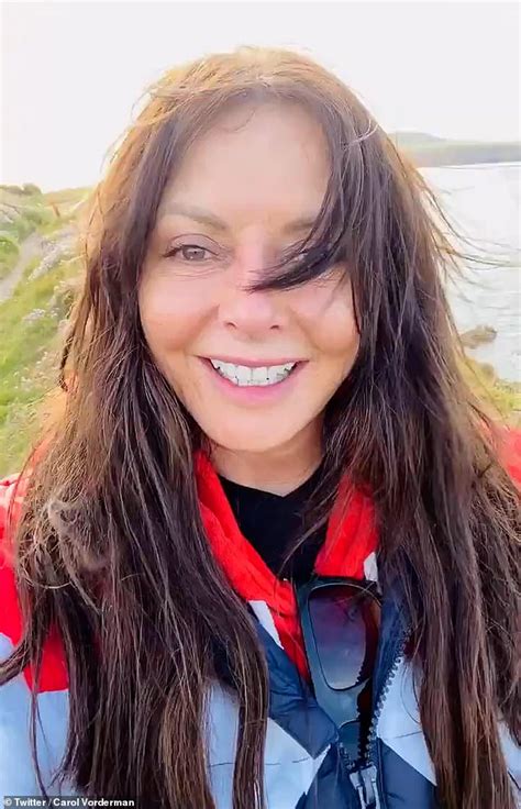 carol vorderman enjoys a windy hike in the welsh countryside readsector