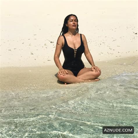 salma hayek sexy in a black one piece swimsuit on the