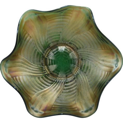 1911 fenton comet green carnival glass ruffled bowl from
