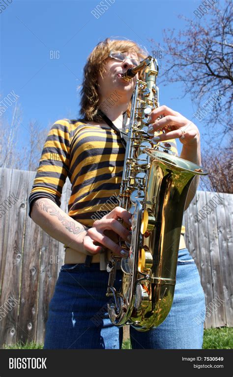 Woman Plays Saxophone Image And Photo Free Trial Bigstock
