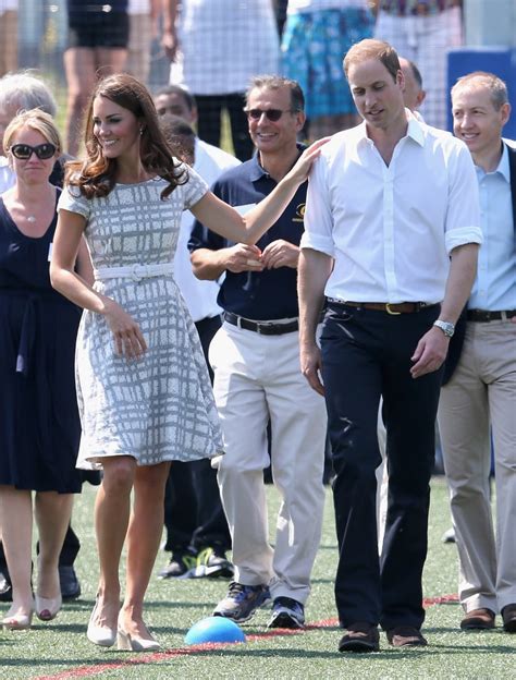 kate middleton put a hand on prince william s shoulder while they prince william and kate