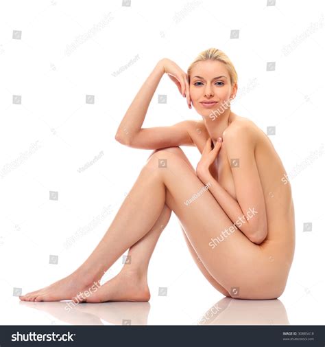 Beautiful Naked Woman Poses Isolated On A White