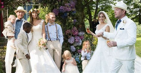 guy ritchie and jacqui ainsley share intimate wedding photos giving