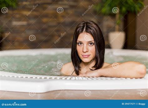 Young Woman Relaxing In The Hot Tub Stock Image Image 29477571
