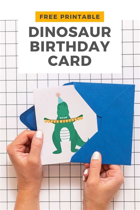 holding   dinosaur birthday card   text