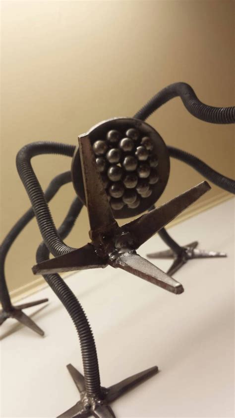 metal robot steampunk combat drone sculpture