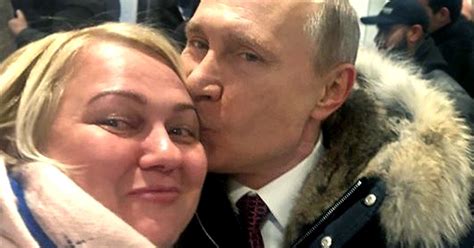 vladimir putin kisses supporter in bizarre campaign trail selfio