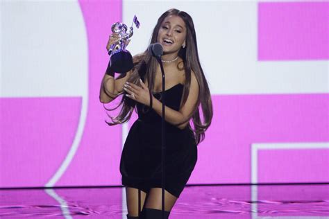 Watch Ariana Grande Performs Live Among Flowers In Pov Video