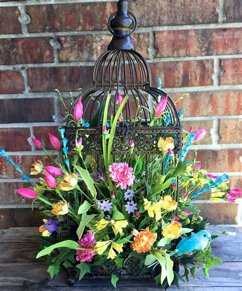 beautiful summerspring floral arrangement   birdcage visit wwwfacebookcomsouthernsass