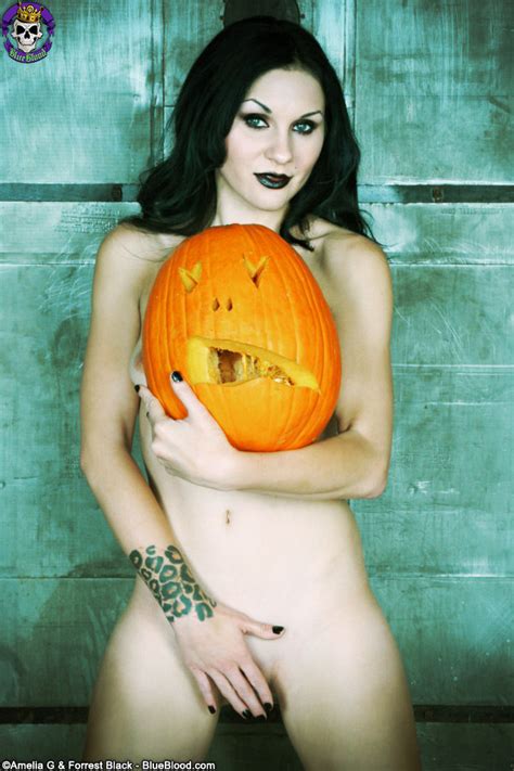 jenny trouble posing nude with halloween pumpkin 1 of 1
