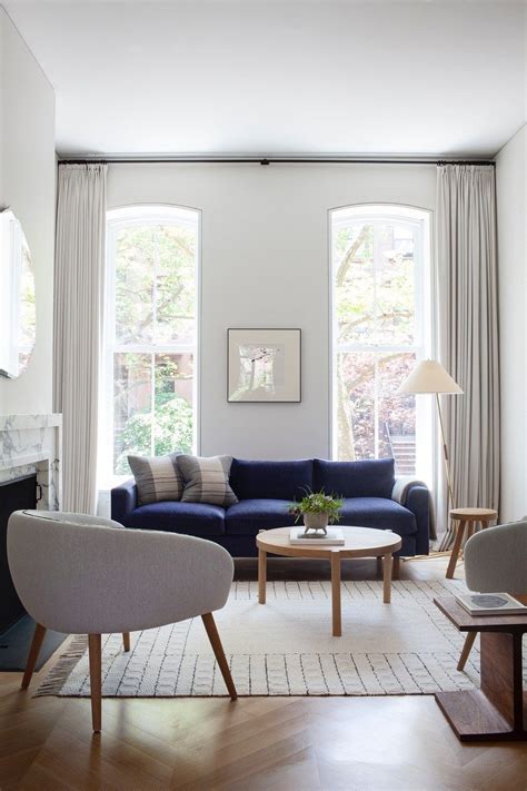 brooklyn brownstone reno  wood detailing  unexpected places   velvet sofa living