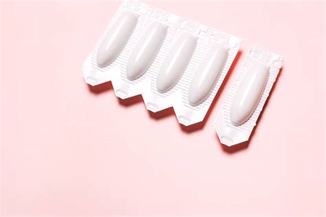 Vaginal Suppository On A Pink Background For The Treatment Of