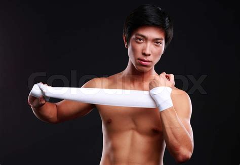boxer preparing for a fight bandaging his hands stock image colourbox