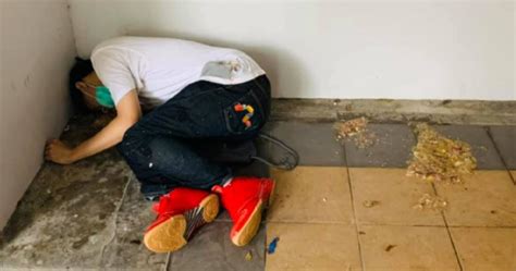 Drunk Man Passed Out On Void Deck Floor Beside His Own Vomit
