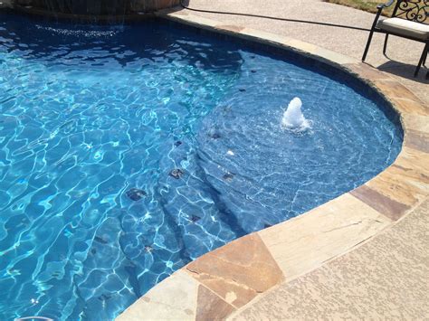 custom swimming pool steps and tanning ledges new wave pools austin