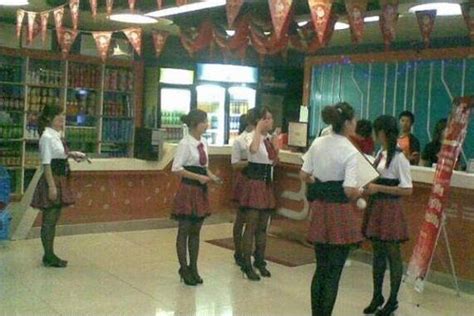 schoolgirls keep customers company in chinese internet bar