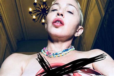 madonna flashes her nipple in bizarre topless selfie