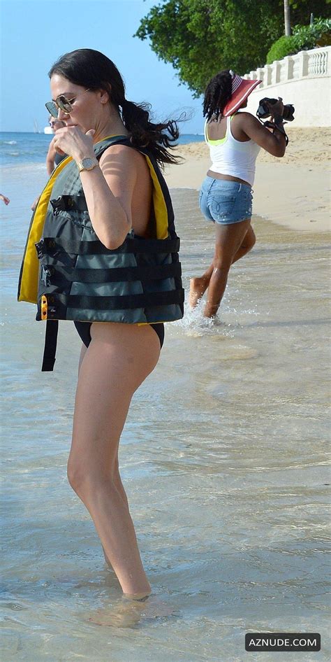Simon Cowell And Socialite Lauren Silverman Enjoy A Beach Day In