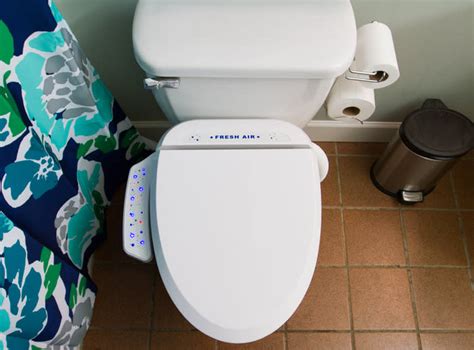 toilet seat with built in fan sucks out the stench
