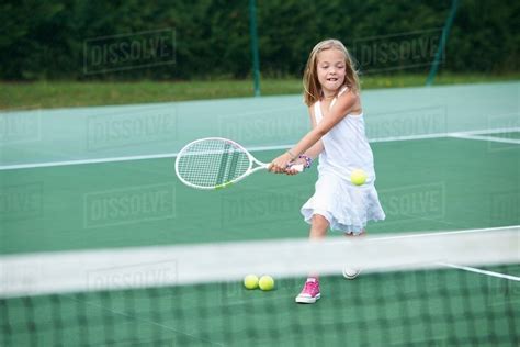 girl playing tennis  court stock photo dissolve