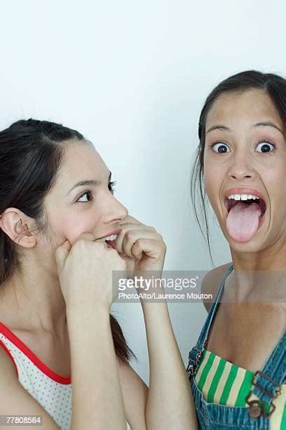 Teenage Girls And Sticking Out Tongue Bildbanksfoton Och Bilder Getty