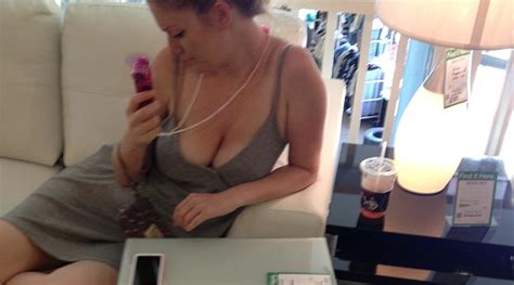 candid cleavage photo busty milf cools off with a portable fan