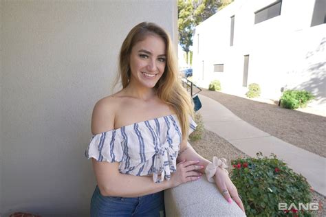 kenzie madison wears tight clothes while she poses photos