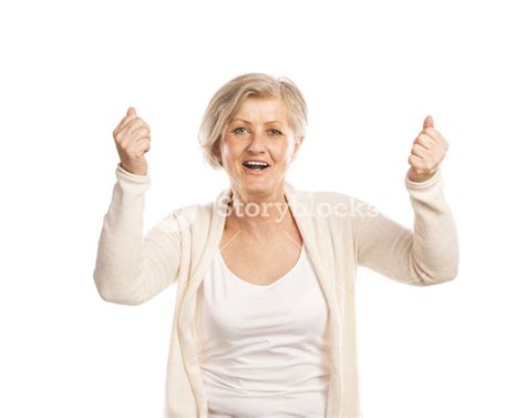 Portrait Of A Happy Senior Woman Saying Yes And Gesturing While