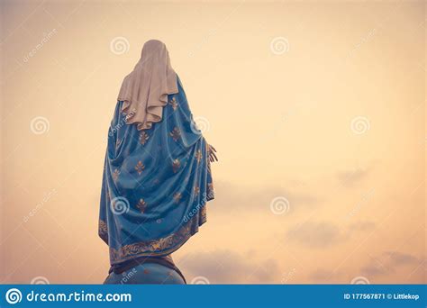 The Blessed Virgin Mary Statue Figure In A Warm Tone