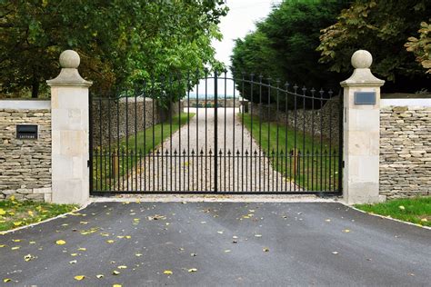 arched driveway gate adds beauty   property