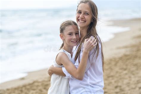 mother  daughter   beach stock photo image  childhood